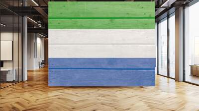 sierra leone flag on wood plank background. Wooden texture flag of sierra leone Wall mural