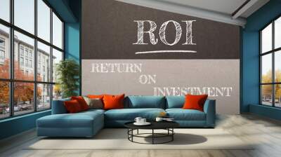 A chalkboard with the word ROI written on it Wall mural