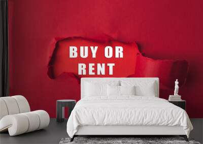 A red background with a white word that says buy or rent Wall mural