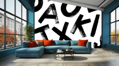 Seamless banner design with bold brush drawn capital letters. Scattered random alphabet letters background. Wall mural