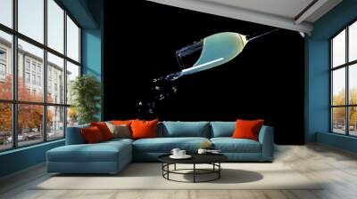 A glass of cocktail on a black background.	 Wall mural