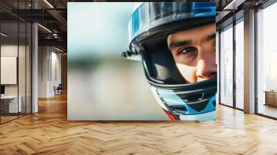 A focused professional racer wearing a helmet looks determined, ready to give his best before the race starts at the circuit. Generative AI Wall mural