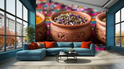 Three traditional clay bowls filled with fragrant Moroccan spices like turmeric, ras el hanout, and saffron, displayed on a colorful textile background. Generative AI Wall mural