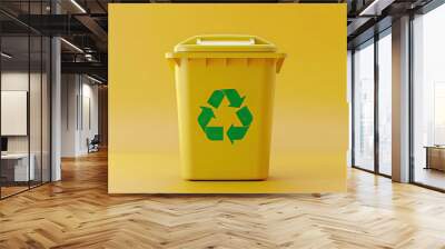 Bright yellow recycling bin with green symbols on a vibrant yellow background in a clean space Wall mural