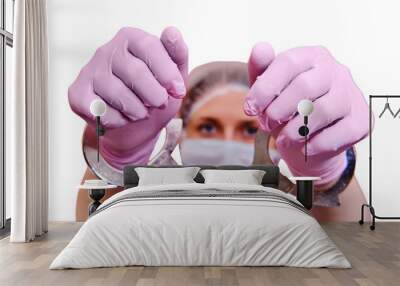 Doctor shows hands in handcuffs on , closeup, isolated on a white background. Hands in medical gloves handcuffed, coronavirus quarantine concept. Wall mural