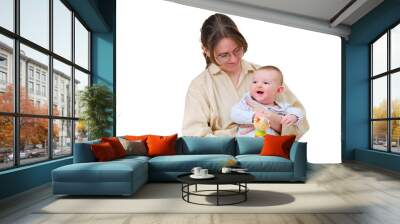 Happy woman mother playing with infant baby on home sofa in living room, isolated on a white background. Kid aged six months Wall mural