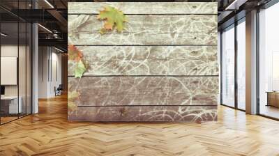 Shabby wood planks with autumn foliage, copy space background Wall mural