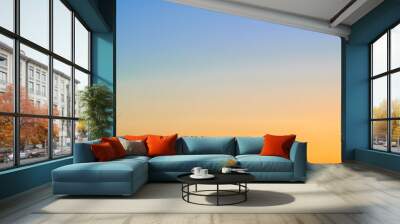 Sunset red and blue gradient sky, copy space for text. Orange-blue sky gradient, clear sky without clouds Wall mural