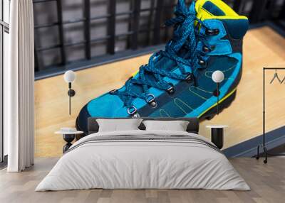 New modern turquoise sports demi-season boots with lacing close-up Wall mural