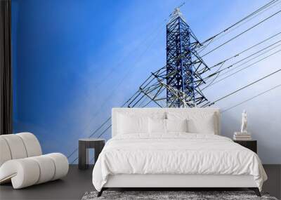 high voltage post.High-voltage tower sky background. Wall mural