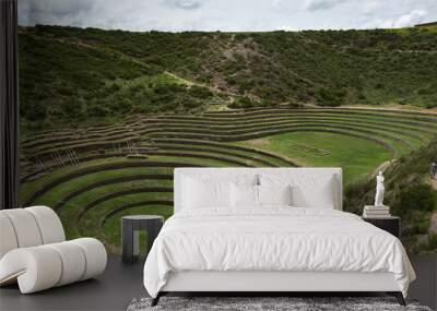 Inca terraces of Moray. Each level has its own microclimate. Moray is an archaeological site near the Sacred Valley Wall mural