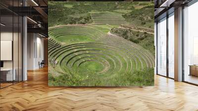 Inca terraces of Moray. Each level has its own microclimate. Moray is an archaeological site near the Sacred Valley Wall mural