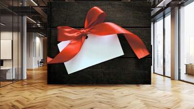 gift box with red ribbon Wall mural