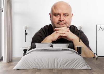 Bald middle-aged man close-up, isolated on white background Wall mural