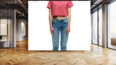 Serious young girl in a red tank top and jeans. Full height. Isolated on a white background. Vertical. Wall mural