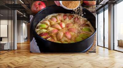 Cornish apple pie step by step, step 6 - putting the dough into the baking dish and adding chopped apples and brown sugar, horizontal, selective focus Wall mural