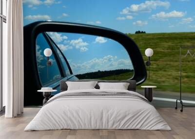 Car mirror on the road Wall mural