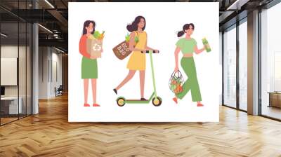 Girls buy organic products. Illustration of happy girls who bring home healthy products, vegetables, greens. Ecological design of vegetarian shopping. Vector women with eco bags in flat style Wall mural