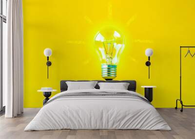 levitating burning bulb on a yellow background Wall mural