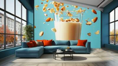 glass of almond milk on light blue background. alternative, gluten free, dairy food,sustainable, healthy vegetarian concept. Wall mural