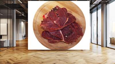 Lots of raw beef steaks with spices on wooden Board. The view from the top. Wall mural