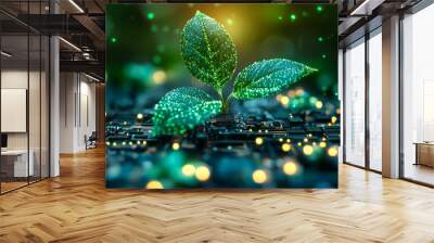 A leaf is growing on a computer chip. The leaf is surrounded by a green background and the image has a futuristic feel to it Wall mural