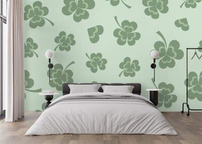 Seamless clover pattern in green colours. Semless pattern with clover on green background. Wall mural