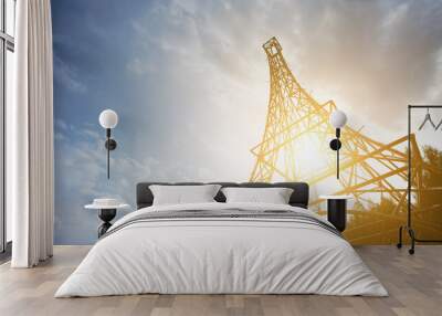 Model of the Eiffel tower in sunny weather from below with sky on background Wall mural