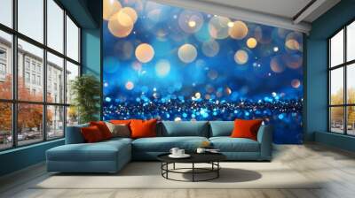 An abstract glittering background containing golden christmas lights and a blue glittery background Wall mural