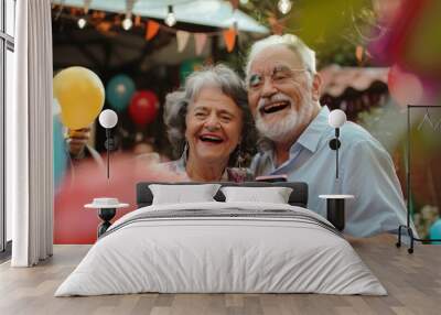 An elderly couple and their conversation at a birthday party for celebrations, laughter, and memories. Seniors with phones for photography, gatherings, and events in the backyard. Wall mural