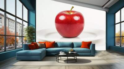 The red apple is isolated on a transparent background with a white plate Wall mural