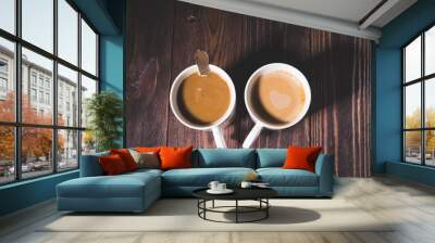 wo white coffee cups on a wooden table Wall mural