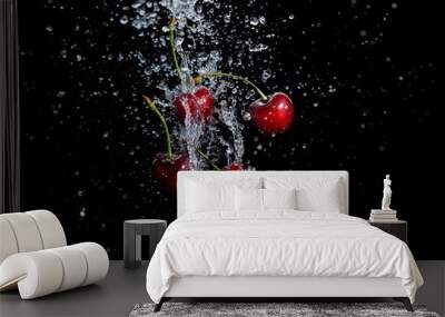 juicy red cherries in water splash on black background Wall mural