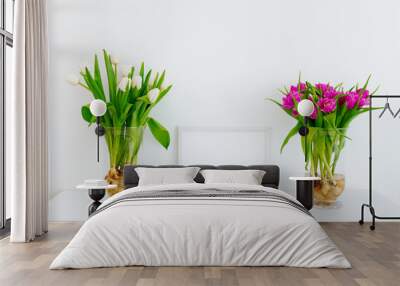 Two bouquets of white and purple tulips on the table Wall mural