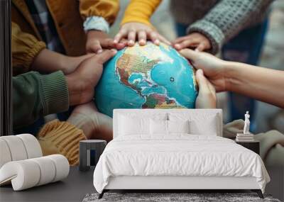 close-up of children's hands on globe. Selective focus Wall mural