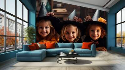 happy Halloween. a group of children in suits and with pumpkins in the home Wall mural