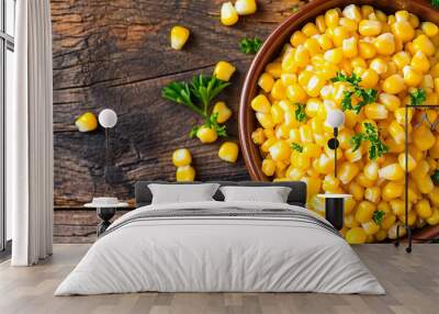 tasty corn in a plate on a wooden background Wall mural