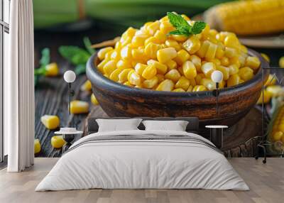 tasty corn in a plate on a wooden background Wall mural