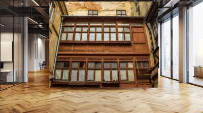 Backstreet side alley in poor old city center with building facade and balcony Wall mural