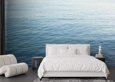 lake blue water smooth surface simple nature background  Wall mural