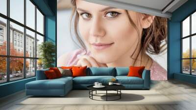 portrait of a beautiful girl with brown eyes, face close-up Wall mural