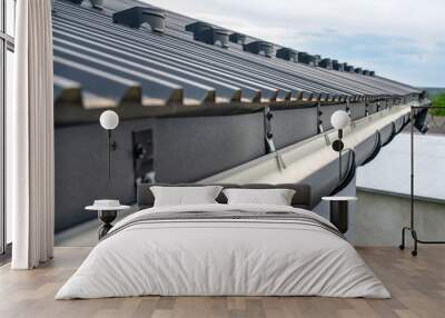 . Gutter system for a metal roof. Holder gutter drainage system on the roof. Wall mural