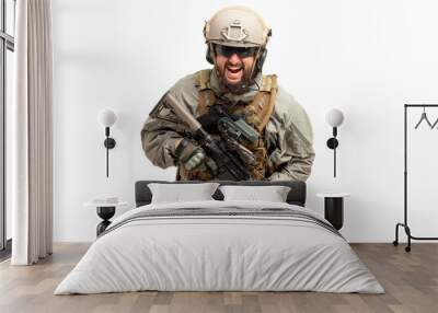 soldier in military equipment and weapons runs forward and screams on a white background, a ranger attacks, portrait of a special forces Wall mural