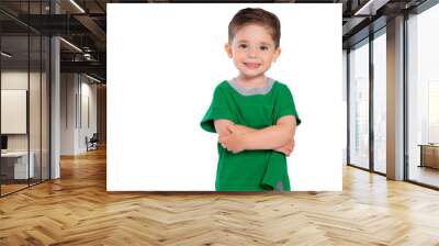 Portrait of a beautiful European boy 2 years old, the child is smiling, folded his hands under his chest. A beautiful and happy child. Isolated on a white background in a green t-shirt. Wall mural