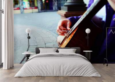 Street guitarist playing Wall mural