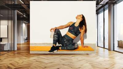 Young Athlete Girl In A Break Of Training Wall mural