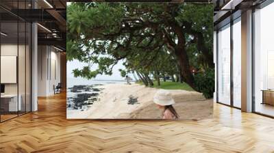 person relaxing on the beach Wall mural