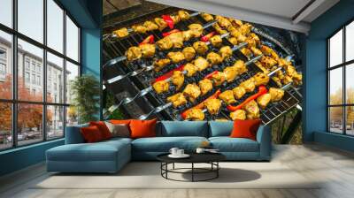 Assorted delicious grilled meat with vegetables over the coals on a barbecue Wall mural