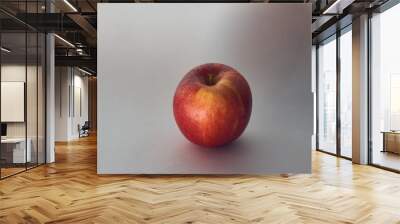 Red apple on white background Wall mural