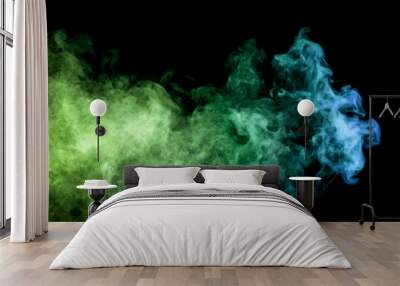 .Colorful blue and  green smoke clouds on dark background.Background of smoke vape. Wall mural